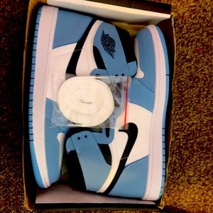 Jordan 1 university blue the box is alittle damaged the shoes are new never worn